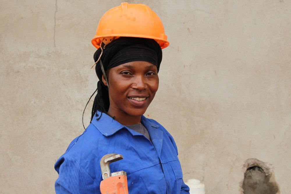 Gaudensia Breaks Barriers to Become a Leading Plumber in Luangwa District