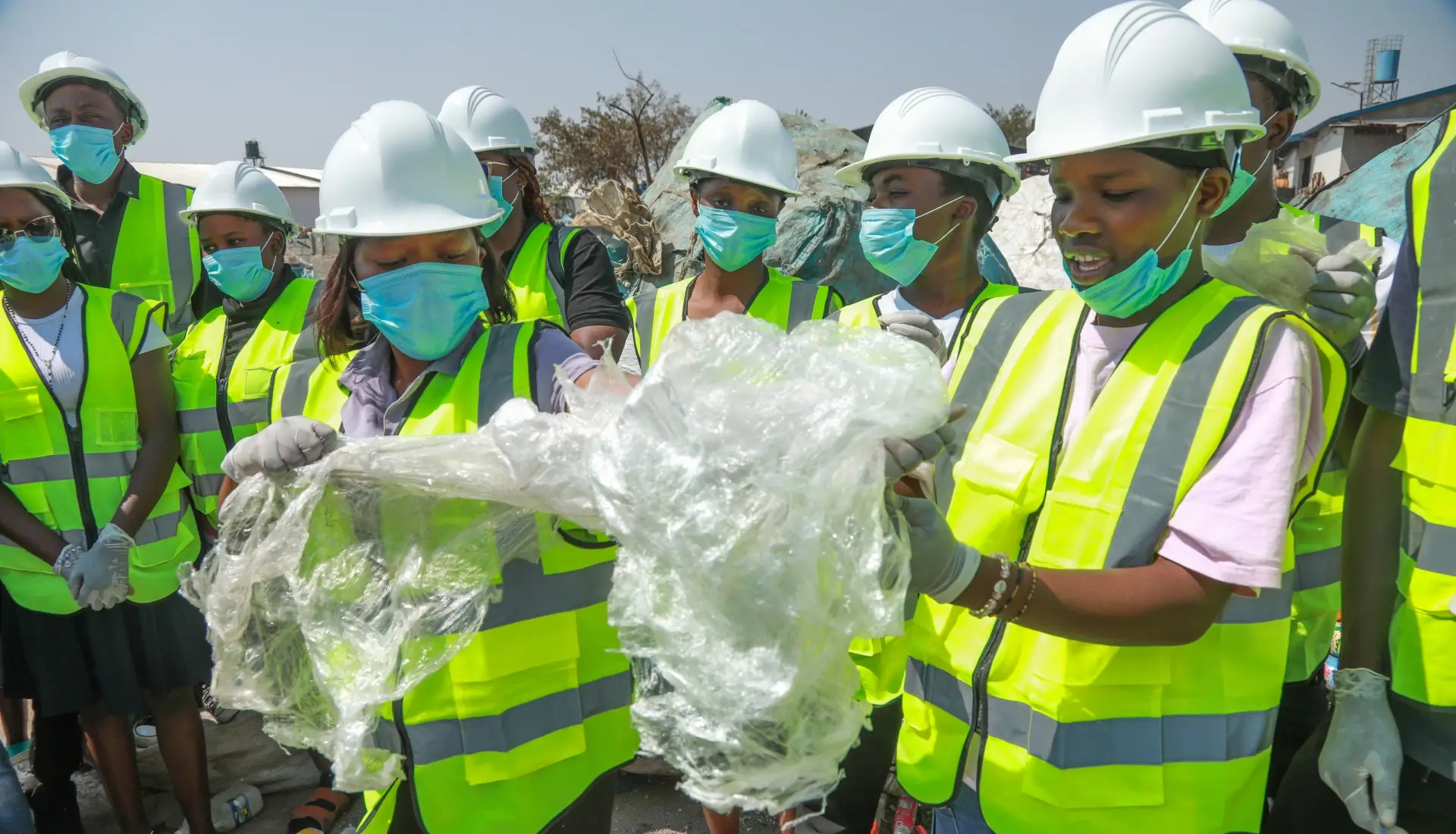 Trained young people collecting waste for recycling