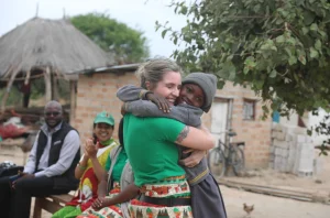 A beautiful reunion as Monica meets her sponsored child, Jiscar, in Chibombo District